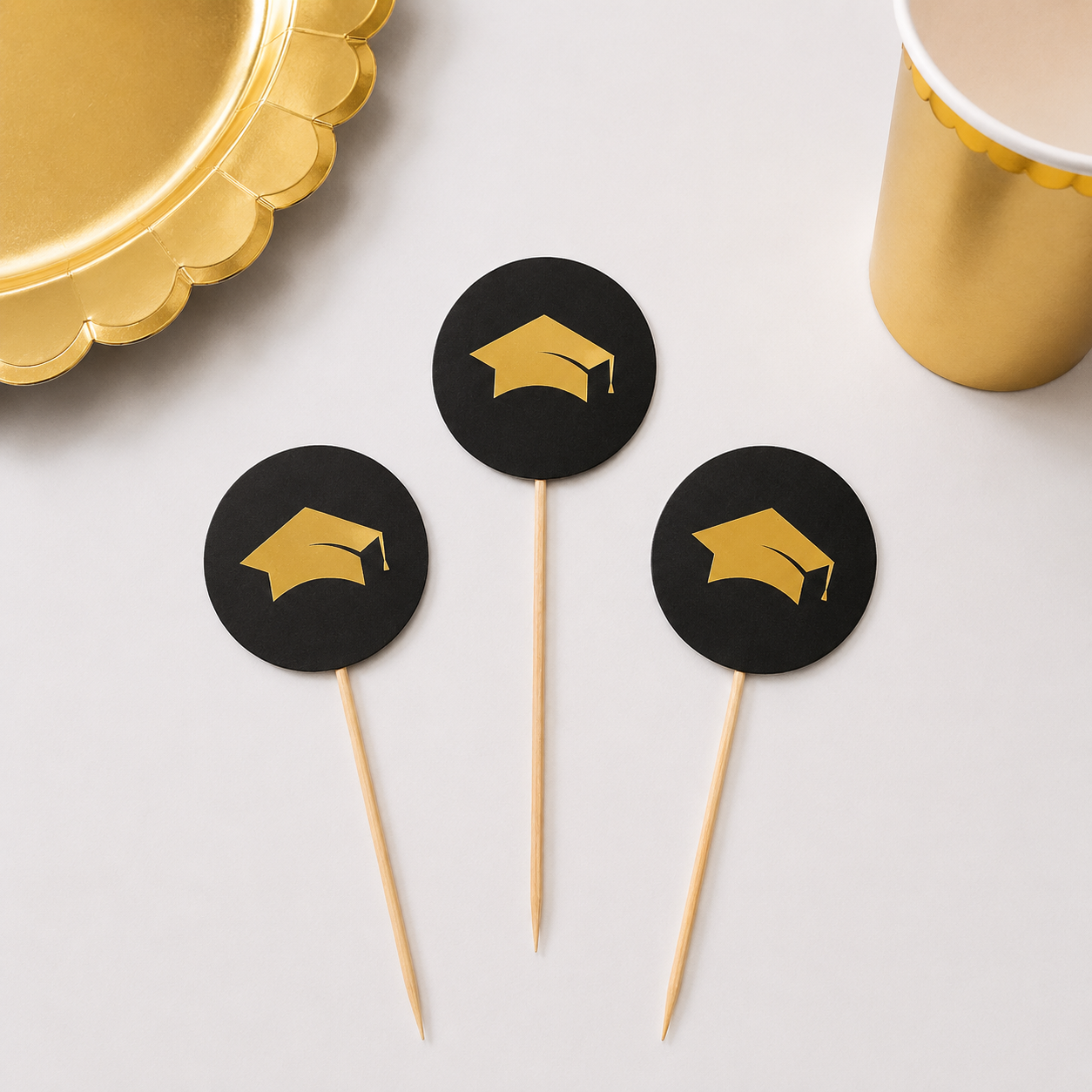 Parttyhub graduation party gold cupcake toppers