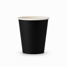 A single black paper cup with a white interior rim, shown on a clean white background.