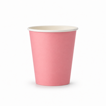 A single pink paper cup with a white inner rim, shown on a clean white background.
