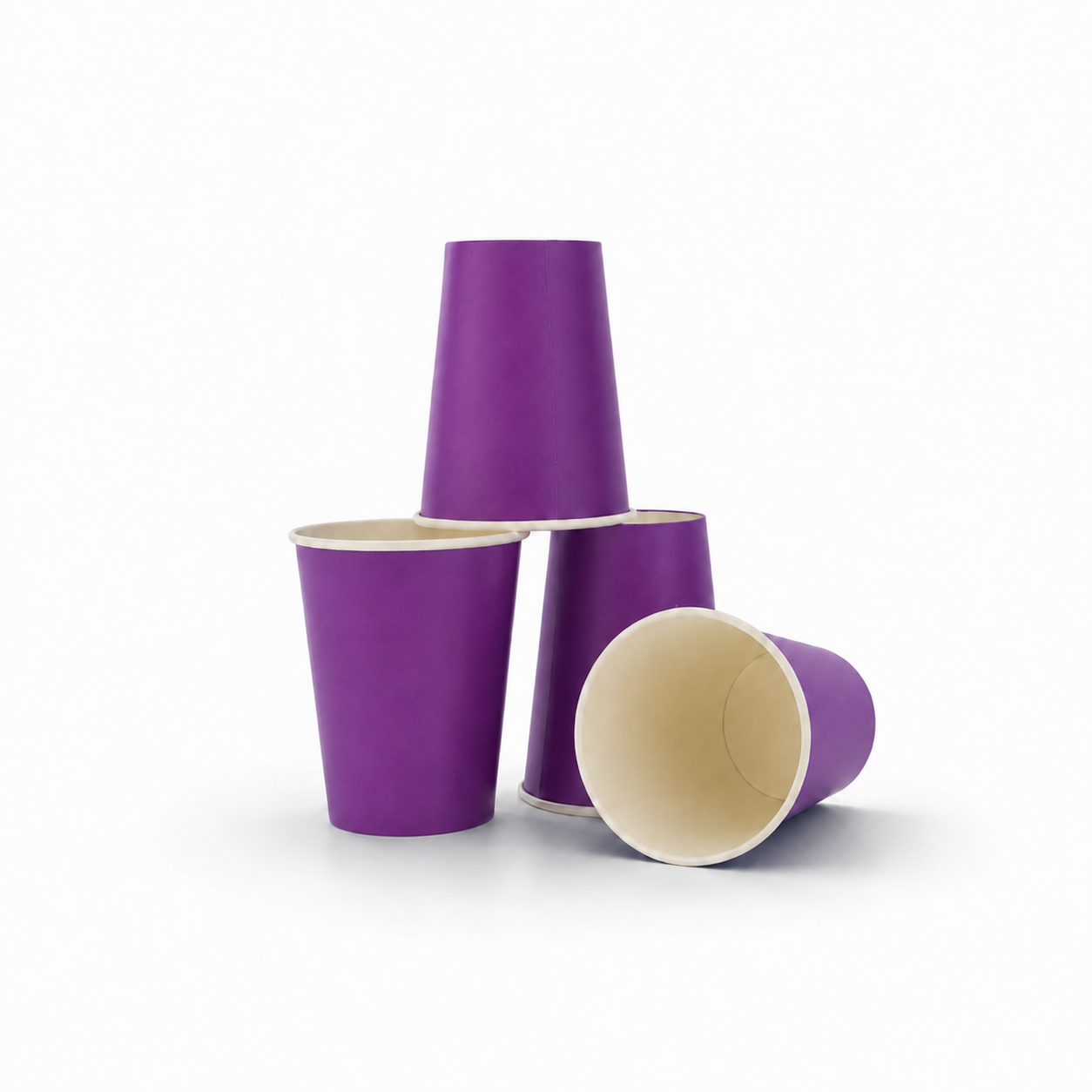 Three purple paper cups with cream-colored interiors, arranged in a stack and flat on a white background.