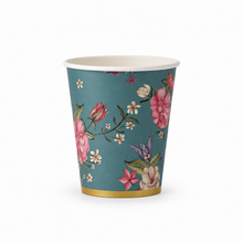 A single paper cup with a teal blue background and a colorful floral print featuring pink, red, purple, and white flowers with green leaves. The cup has a white interior and a metallic gold band at the base, shown on a clean white background.